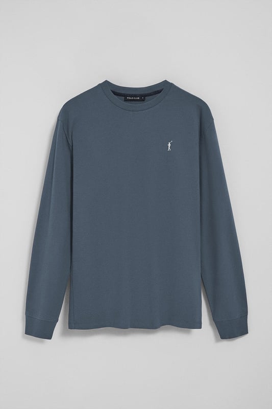 Entdecken Sie die perfekte Kombination aus Schlichtheit und Stil mit unserem klassischen Langarm-T-Shirt für Herren. Es ist aus weicher Baumwolle gefertigt und bietet den Komfort, den Sie sich von einem Essential wünschen. Der gerippte Rundhalsausschnitt sorgt für eine bequeme Passform. Das mit Logo versehene Nahtband der Krageninnenseite unterstreicht das Finish. Die unverwechselbare Rigby Go-Stickerei in Kontrastfarbe auf der Brust ist das i-Tüpfelchen, das dieses Poloshirt zu einem Must-Have in Ihrer Garderobe macht.
