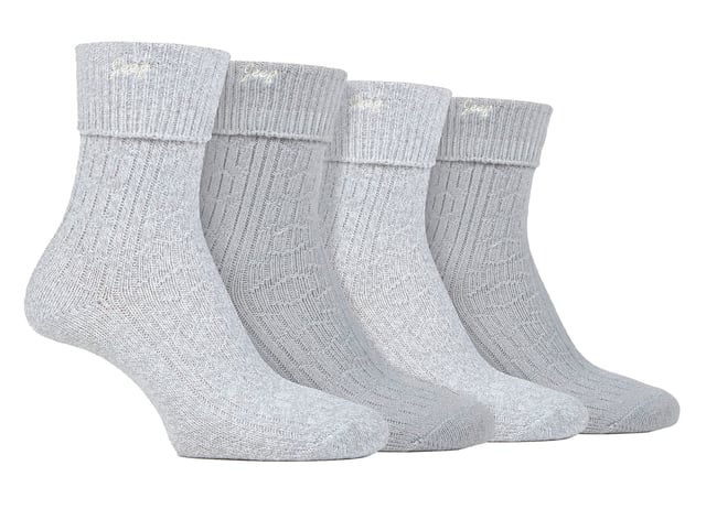 Jeep Ladies 4 Pack Turn Over Top Boot Socks: Introducing the Jeep Super Soft Turn Over Top Boot Socks, a delightful twin-packed set designed for ultimate comfort and cosiness. Crafted from 97% Polyester and 3% Elastane, these crew length ladies' socks boast a silk-like feel and are exceptionally breathable. The medium thickness, ribbed legs, and standard toe seams add to their appeal, making them a perfect match for ankle-length boots. With a charming Jeep embroidery on the turn over top cuffs, these socks come in complementing plain and marl colours. Their enhanced decorative ribbed pattern exudes elegance and style. Despite the thick knit, these socks efficiently release moisture and allow air movement, ensuring your feet stay comfortable throughout the day. Machine washable at 40°, these Jeep Super Soft Turn Over Top Boot Socks offer unbeatable softness and warmth, making them a must-have addition to your sock collection. Treat your feet to a luxurious experience with these indulgent socks. Extra Product Details: Made of 97% Polyester, 3% Elastane - silk-like feel, highly breathable. Perfect fit for ankle-length boots, medium thickness, ribbed legs. Charming Jeep embroidery, complementing plain & marl colors. Elegant ribbed pattern, moisture-wicking & airflow design. Machine washable at 40°, unbeatable softness & warmth. Luxurious experience for your feet, a must-have addition to your collection.