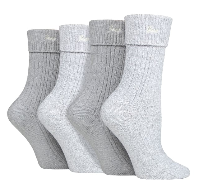 Jeep Ladies 4 Pack Turn Over Top Boot Socks: Introducing the Jeep Super Soft Turn Over Top Boot Socks, a delightful twin-packed set designed for ultimate comfort and cosiness. Crafted from 97% Polyester and 3% Elastane, these crew length ladies' socks boast a silk-like feel and are exceptionally breathable. The medium thickness, ribbed legs, and standard toe seams add to their appeal, making them a perfect match for ankle-length boots. With a charming Jeep embroidery on the turn over top cuffs, these socks come in complementing plain and marl colours. Their enhanced decorative ribbed pattern exudes elegance and style. Despite the thick knit, these socks efficiently release moisture and allow air movement, ensuring your feet stay comfortable throughout the day. Machine washable at 40°, these Jeep Super Soft Turn Over Top Boot Socks offer unbeatable softness and warmth, making them a must-have addition to your sock collection. Treat your feet to a luxurious experience with these indulgent socks. Extra Product Details: Made of 97% Polyester, 3% Elastane - silk-like feel, highly breathable. Perfect fit for ankle-length boots, medium thickness, ribbed legs. Charming Jeep embroidery, complementing plain & marl colors. Elegant ribbed pattern, moisture-wicking & airflow design. Machine washable at 40°, unbeatable softness & warmth. Luxurious experience for your feet, a must-have addition to your collection.