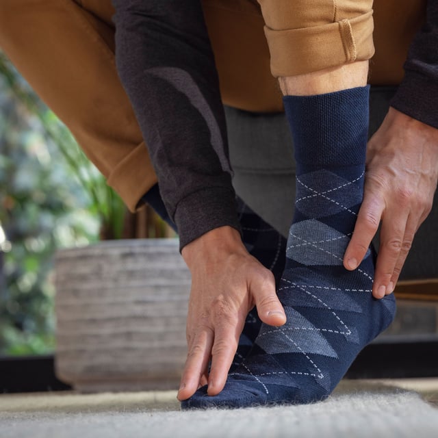 Gentle Grip  NON ELASTIC Bamboo Socks: If comfort is your sole goal when searching for a pair of socks, then consider these pair of Gentle Grip  NON ELASTIC bamboo socks to be the one of the best. Bamboo is credited as the modern ‘super fibre’, Gentle Grip is an esteemed sock brand focusing solely on comfort and a  NON ELASTIC technique is highly recommended to reduce pressure in the foot… everything seems to be right about this sock. Why Bamboo is great: Bamboo is commonly known to be an awesome material. Here are 3 reasons why bamboo is the best. Moisture wicking – Bamboo fibres naturally control temperatures, so a brilliant fibre knitted into socks. Antibacterial – Bamboo draws away the moisture meaning no room for it manoeuvre, therefore preventing potential foot infections. Super soft – Bamboo is considered a luxury fibre when keeping feet soft and comfortable. Gentle Grip – Non Elastic Honeycomb Top: Combining a natural bamboo blend and  NON ELASTIC honeycomb top gentle grip socks into one package could be the perfect pair of socks for your feet if comfort is your main goal. Extra Product Details: * 6 pair pack, Bamboo socks,  NON ELASTIC, Honeycomb top, Strengthened heel and toe, 5 designs to choose between, 77% Viscose Bamboo 17% Polyester and 1% elastane, Size 6-11 uk, 39-45 eur, 7-12 us, Machine washable