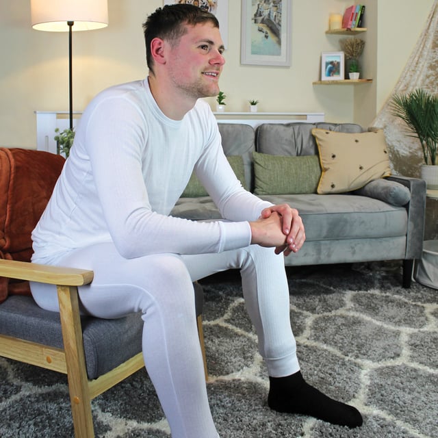 THMO - Men’s Thermal Long Johns Bottoms: Whether you're braving the great outdoors or just seeking extra warmth and comfort at home, the THMO Men's Original Thermal Underwear Bottoms is your go-to solution for a warmer life. Crafted from high-quality micro-fleece fabric, these thermal bottoms boast exceptional stretch properties and comfort seams, ensuring unrestricted movement and a snug, non-chafing fit that's perfect for layering beneath your clothing. Say goodbye to discomfort and hello to warmth!. Featuring advanced moisture and odour management technology, these thermal bottoms keep you dry and fresh throughout the day, making it an ideal choice for active lifestyles and chilly environments. At the heart of every THMO base layer lies our innovative super-soft thermal microfleece. . These thermal bottoms are available in Black or White and are made from 52% Polyester & 48% Cotton. They come in 4 Men’s sizes: Medium, Large, X-Large & XX-Large and are Machine Washable at 30°C. Extra Product Details: THMO Thermal Underwear Bottoms Micro-Fleece Fabric Comfort Stretch & Seams Moisture & Odour Management Ideal For Winter Super Soft & Warm Available In Black & White 52% Polyester, 48% Cotton Machine Washable at 30°C