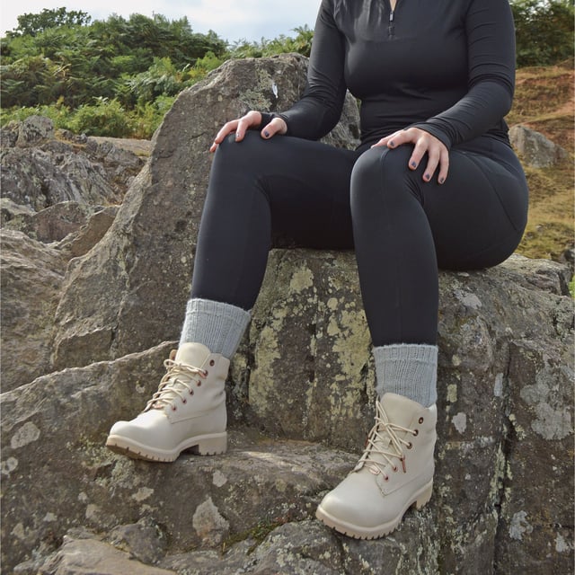 Ladies 100% Wool Bed Socks: Socks that are made from 100% wool and that are fully functional can be hard to find. These ladies 100% wool bed socks are as warm and cuddly as they look. Wool is traditionally known to be one of the best insulating fibres around, trapping warm air and holding it close to your skin. With a 100% wool material composition, these socks have the ultimate ability to keep your feet warm. The top of the sock also has a loose fit - facilitating blood circulation, great if you are relaxing around the house or in bed for a less constrictive feel. These ladies socks also have a ribbed Nordic-like pattern that rides up the sock from the toe to the welt. This pair of ladies 100% wool bed socks are available in the colour natural and are a size 4-7 UK 37-42 eur. They come in a 1 pair pack and are machine washable. Extra Product Details: - 1 Pair Pack - Size 4-7 UK 37-42 - Ladies socks - 100% Wool - Perfect for relaxing - Non-constricting top - Nordic-like knitting pattern - Machine Washable