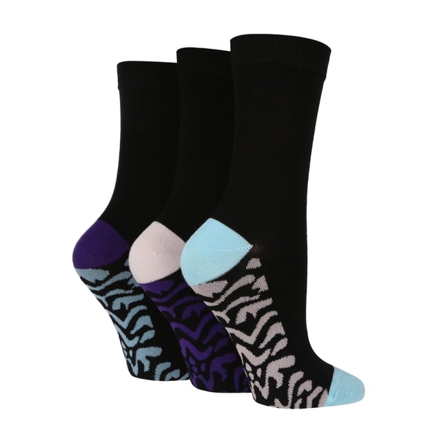 Wildfeet - Ladies 3 Pair Bamboo Socks with Foot Patterns: Smooth, silky and super-soft in beautiful bamboo, these three pairs of Wildfeet Patterned Bamboo Socks are the ideal everyday socks for anyone with delicate or sensitive skin. The mixed colour designs will look good for every occasion. The lightweight and breathable knit combines with moisture-managing and thermoregulating, naturally antibacterial bamboo to give you happier, drier and fresher-feeling feet through your day. Bamboo is eco-friendly and sustainable. Better yet, the packaging for these socks is made using recycled paper. For extra durability, toes and heels have been invisibly reinforced too. They also come in 7 different colours/designs which include: 2 types of Navy, Black, Blue Spot, Yellow Spot, Purple Zebra and Green Zebra. Wild Feet is a range of socks featuring cool designs, bold colours and quirky catchphrases - from pugs and penguins, to lions and llamas! . There are 7 colours to choose from: Black, Navy, Yellow, Blue, Green & Purple. They come in one size Ladies 4-8 UK, are made from 70% Viscose (from Bamboo), 28% Polyester, 2% Elastane and are machine washable. Extra Product Details: Ladies Wildfeet Patterned Socks Cute Foot Patterns Super Soft Bamboo Fibres 7 Colours/Design Options Made For Everyday A Great Gift Idea The Ideal Stocking Filler Soft & Breathable One Size: 4-8 UK Machine Washable