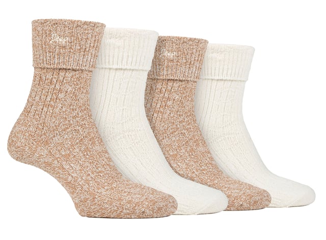 Jeep Ladies 4 Pack Turn Over Top Boot Socks: Introducing the Jeep Super Soft Turn Over Top Boot Socks, a delightful twin-packed set designed for ultimate comfort and cosiness. Crafted from 97% Polyester and 3% Elastane, these crew length ladies' socks boast a silk-like feel and are exceptionally breathable. The medium thickness, ribbed legs, and standard toe seams add to their appeal, making them a perfect match for ankle-length boots. With a charming Jeep embroidery on the turn over top cuffs, these socks come in complementing plain and marl colours. Their enhanced decorative ribbed pattern exudes elegance and style. Despite the thick knit, these socks efficiently release moisture and allow air movement, ensuring your feet stay comfortable throughout the day. Machine washable at 40°, these Jeep Super Soft Turn Over Top Boot Socks offer unbeatable softness and warmth, making them a must-have addition to your sock collection. Treat your feet to a luxurious experience with these indulgent socks. Extra Product Details: Made of 97% Polyester, 3% Elastane - silk-like feel, highly breathable. Perfect fit for ankle-length boots, medium thickness, ribbed legs. Charming Jeep embroidery, complementing plain & marl colors. Elegant ribbed pattern, moisture-wicking & airflow design. Machine washable at 40°, unbeatable softness & warmth. Luxurious experience for your feet, a must-have addition to your collection.