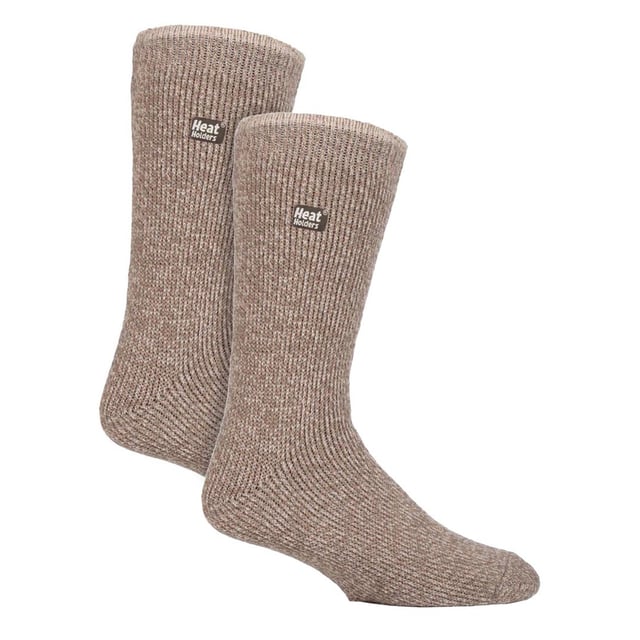Heat Holders Men’s 2 Pack Merino Wool Thermal Socks: Ensure your feet stay snug and cosy even on the chilliest winter days with these top-notch Heat Holders thermal socks boasting a 2.9 TOG rating. Crafted with a blend of merino wool renowned for its exceptional heat retention and moisture-wicking abilities, these long thermal socks employ cutting-edge knitting technology unique to Heat Holders, guaranteeing unmatched warmth and comfort. Indulge in all-day warmth and comfort with these thermal socks featuring a longer looped pile and luxuriously soft brushed inner layer, designed to effectively trap heat and cushion your feet. . These men’s merino wool socks are available in 6 great colours: Black, Grey, Blue, Brown, Khaki, Oatmeal and are made from 54% Acrylic 36%, Wool, 5% Nylon, 4% Polyester, 1% Elastane. They are machine washable (on a gentle cycle) and are available in a two pair pack. Extra Product DetailsHeat Holders Merino Wool Socks 2 Pair Multi Pack Reinforced Heel & Toe Soft Merino Wool Soft Brushed Inner 2.9 TOG Rating Superior Warmth Men’s One Size: 6-11 UK Machine Wash Cold On Gentle Cycle