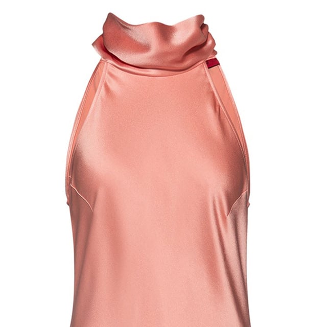 Adorable dress in Midi length. With scarf detail on the neck and fabric covered buttons.