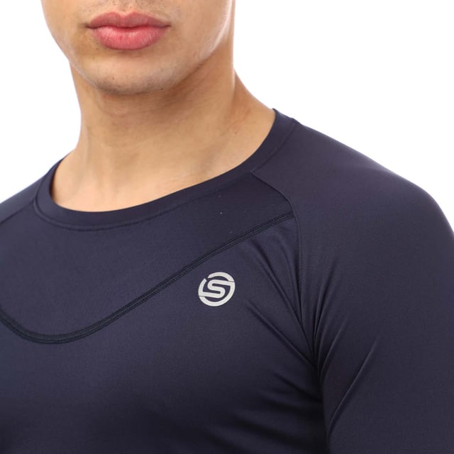 Mens Skins Series-3 Long Sleeve T- Shirt in navy.- Round neck.- Long sleeves.- Mesh panelling for improved breathability and movement.- Silver reflective logos.- 100% Polyester.- Ref: ST40754569010