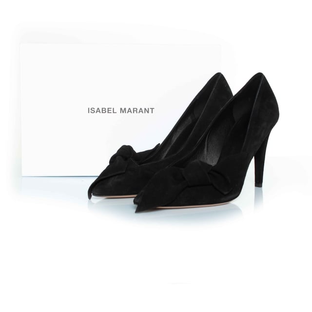 Isabel Marant, Poetty evening bow pumps in black. The item is new and comes with box, dustbag and extra set of heels. 
 CONDITION: new

SIZE: 39

INSOLE MEASUREMENTS: 25 cm

HEEL MEASUREMENTS: 10 cm PLATFORM: 0.5 cm

MATERIAL: suede

COLOUR: blackMeasurments: