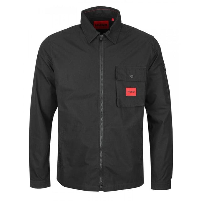 A trend-driven zip-up overshirt by HUGO Menswear in cotton-rich canvas, featuring a zipped pocket at the sleeve and a red logo label.
Regular fitCamp collarPatch chest pocketsSquared cuffs
75% Cotton, 25% Polyamide
50482701
 
 
