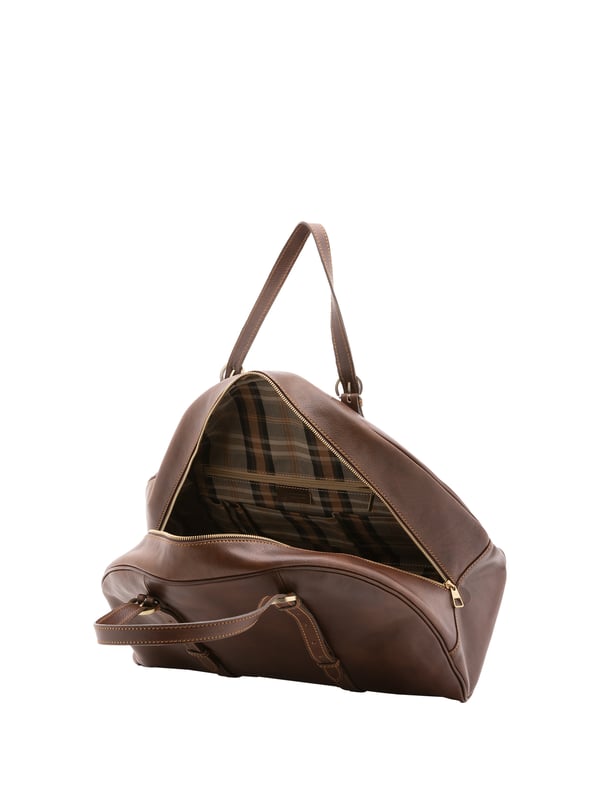 Alessia Firenze Bolsa de viaje Unisexo Bolsa de viaje unisex. El cierre es con cremallera. Los bolsillos internos son uno con cremallera. Los bolsillos externos están ausentes. Falta la correa para el hombro. El mango es de piel. Hay un compartimento interno. El material exterior es 100% Piel Auténtica. Internamente está forrado en algodón. Medidas: 47x34x22 cm. Hecho en Italia