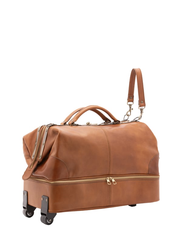 Unisex-Reisetasche mit Reißverschluss. eine mit Reißverschluss-Innentaschen. eine auf der Unterseite mit Außentaschen mit Reißverschluss. verstellbarer und abnehmbarer Schultergurt aus Leder. abnehmbarer Ledergriff. ein Innenfach.  Außenmaterial. Innen mit Baumwolle gefüttert. Maße: 54x40x29 cm. Hergestellt in Italien