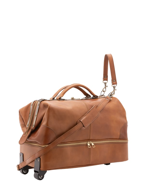 Unisex-Reisetasche mit Reißverschluss. eine mit Reißverschluss-Innentaschen. eine auf der Unterseite mit Außentaschen mit Reißverschluss. verstellbarer und abnehmbarer Schultergurt aus Leder. abnehmbarer Ledergriff. ein Innenfach.  Außenmaterial. Innen mit Baumwolle gefüttert. Maße: 54x40x29 cm. Hergestellt in Italien