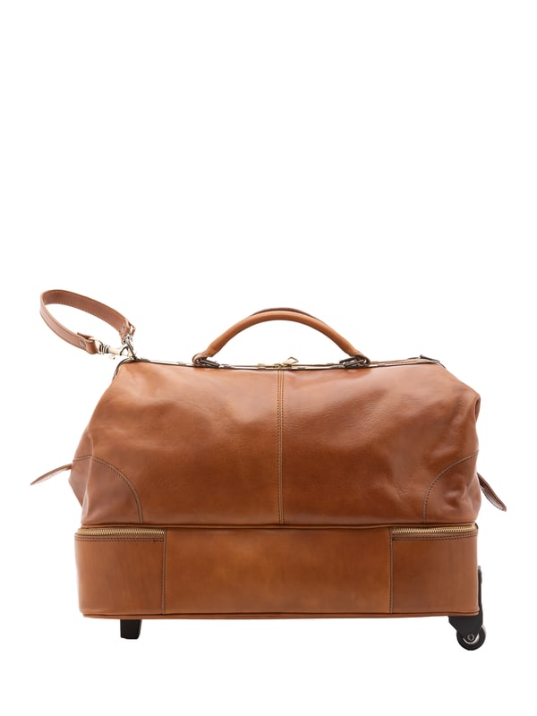 Unisex-Reisetasche mit Reißverschluss. eine mit Reißverschluss-Innentaschen. eine auf der Unterseite mit Außentaschen mit Reißverschluss. verstellbarer und abnehmbarer Schultergurt aus Leder. abnehmbarer Ledergriff. ein Innenfach.  Außenmaterial. Innen mit Baumwolle gefüttert. Maße: 54x40x29 cm. Hergestellt in Italien