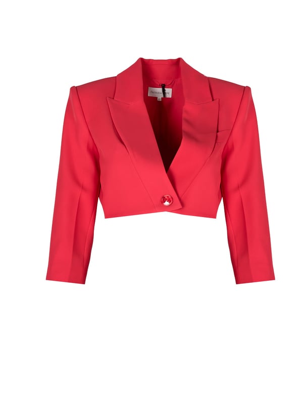 Kort en aansluitend gesneden, ideaal om het silhouet te benadrukken, voegt het elegantie en moderniteit toe aan elke outfit en zorgt ervoor dat je je zelfverzekerd en stijlvol voelt in elke situatie.

Hij sluit met een knoop met label, wat niet alleen praktisch is, maar ook een subtiel designaccent toevoegt dat een vleugje luxe en prestige aan je look geeft.

Met een 7/8 mouw, een uitstekende keuze voor elk seizoen, biedt het bewegingsvrijheid en de mogelijkheid om je favoriete sieraden te laten zien, wat elegantie en gemak toevoegt aan de algehele look.

De vulling en voering zorgen niet alleen voor een perfecte vorm en comfort, maar benadrukken ook de zorg voor vakmanschap en aandacht voor detail waarmee dit product zich onderscheidt van andere.

Gemaakt van hoogwaardige stof die duurzaamheid en kreukbestendigheid garandeert, zodat het kledingstuk er altijd onberispelijk uitziet en comfortabel is om te dragen.

Made in Italy, synoniem voor uitmuntend vakmanschap en een lange modetraditie, garandeert dat elk element met uiterste precisie en passie is vervaardigd.