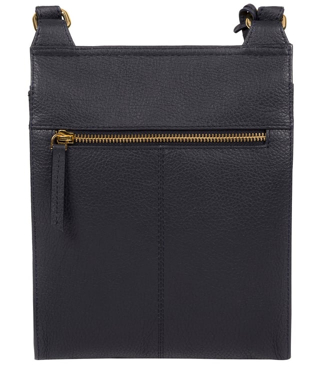 The 'Naomi' cross body bag from Pure Luxuries London is crafted from leather that has a soft pebble grain finish. The fold over top conceals the 100% untreated cotton lined compartment which is complemented by pockets on the interior and exterior of the bag, providing organised storage for all of your essentials. Comes with an adjustable and matching leather strap to suit your needs. Adorned with eye-catching gold coloured fittings and finished with the Pure Luxuries London charm and logo.