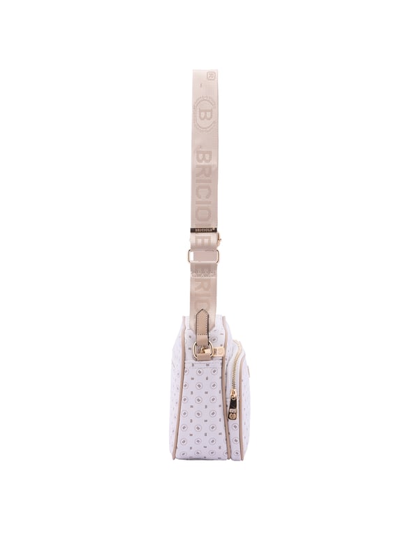 Bolso bandolera para mujer. El cierre es con cremallera. Los bolsillos internos son uno con cremallera. Los bolsillos externos son uno delantero con cremallera y otro trasero con cremallera. La bandolera es ajustable en tela. Falta el mango. Hay un compartimento interno. El material exterior es ecopiel. Internamente está forrado en poliéster. Medidas: 18x28x11 cm. Producto de moda