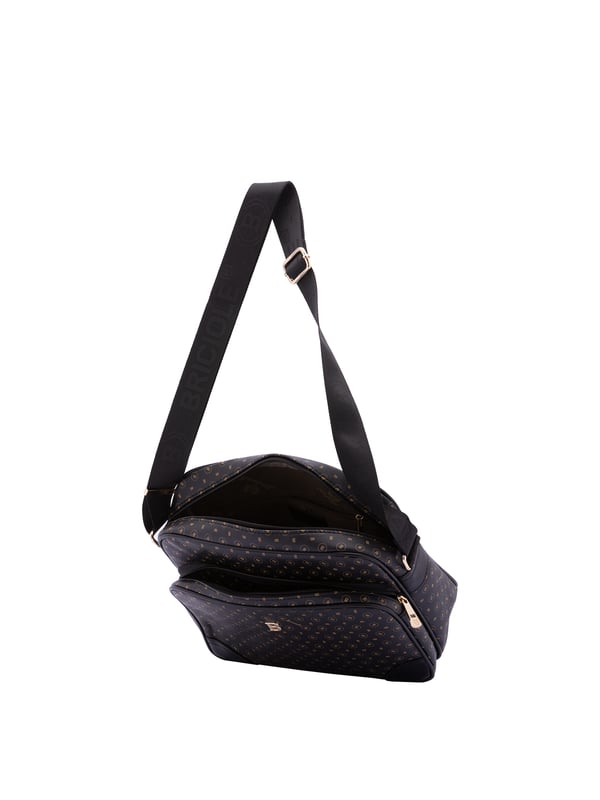 Bolso bandolera para mujer. El cierre es con cremallera. Los bolsillos internos son uno con cremallera. Los bolsillos externos son uno delantero con cremallera y otro trasero con cremallera. La bandolera es ajustable en tela. Falta el mango. Hay dos compartimentos internos. El material exterior es ecopiel. Internamente está forrado en poliéster. Medidas: 24x29x13 cm. Producto de moda