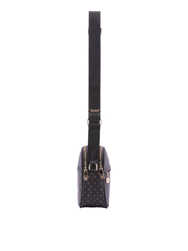 Briciole Bolso de hombro Mujer Bolso bandolera para mujer. El cierre es con cremallera. Los bolsillos internos son uno con cremallera. Los bolsillos externos son uno delantero con cremallera y otro trasero con cremallera. La bandolera es ajustable en tela. Falta el mango. Hay dos compartimentos internos. El material exterior es ecopiel. Internamente está forrado en poliéster. Medidas: 19x26x9 cm. Producto de moda