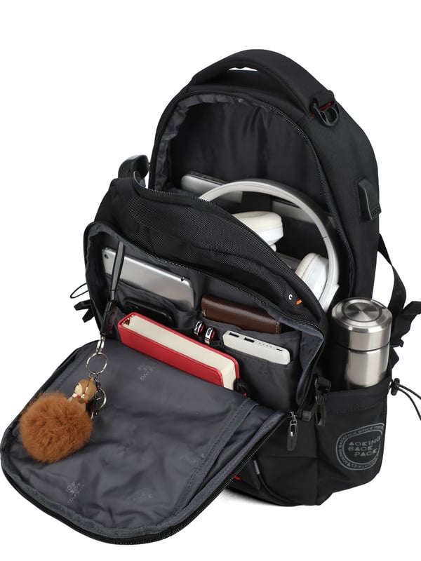 Aoking Mochila Hombres Mochila de hombre. El cierre es con cremallera. Los bolsillos internos son bolsillos multifuncionales. Los bolsillos externos son dos frontales con cremallera y dos bolsillos laterales abiertos. La bandolera es ajustable en tela. El mango es de tela. Hay dos compartimentos internos. El material exterior es 100% Poliéster. Internamente es 100% Poliéster. Medidas: 34x48x16 cm. Producto de moda