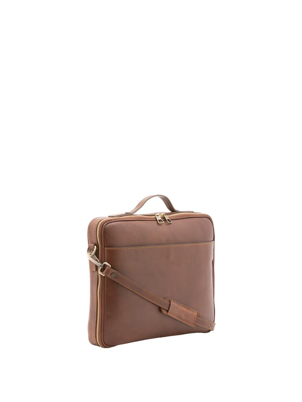 Alessia Firenze bolso de mano Unisexo Bolso unisex. El cierre es con cremallera. Los bolsillos internos son uno abierto. Los bolsillos externos son un frente abierto. La bandolera es ajustable y extraíble en piel. El mango es de piel. Hay un compartimento interno. El material exterior es 100% Piel Auténtica. Internamente está forrado en algodón. Medidas: 38x32x6 cm. Hecho en Italia