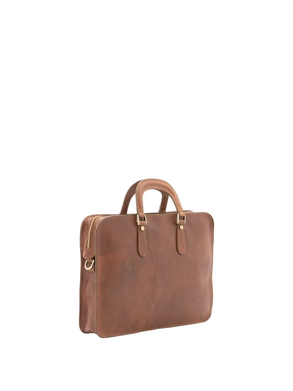 Unisex-Handtasche mit Reißverschluss. zwei offene Innentaschen. fehlende Außentaschen. verstellbarer und abnehmbarer Schultergurt aus Leder. im Ledergriff. ein Innenfach.  Außenmaterial. Innenfutter aus echtem Leder. Maße: 40x30x8 cm. Hergestellt in Italien