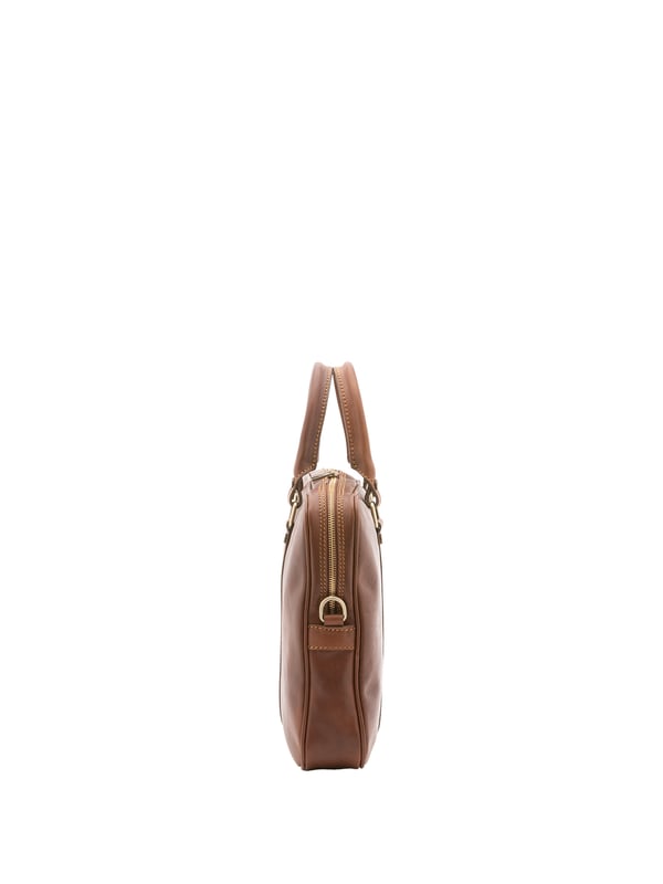 Unisex-Handtasche mit Reißverschluss. eine mit Reißverschluss-Innentaschen. fehlende Außentaschen. verstellbarer und abnehmbarer Schultergurt aus Leder. im Ledergriff. ein Innenfach.  Außenmaterial. Innen mit Baumwolle gefüttert. Maße: 37x31x6 cm. Hergestellt in Italien