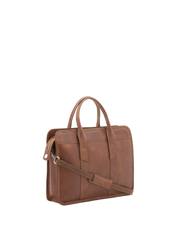 Unisex-Handtasche mit Reißverschluss. eine offene Innentasche. fehlende Außentaschen. verstellbarer und abnehmbarer Schultergurt aus Leder. im Ledergriff. ein Innenfach.  Außenmaterial. Innen mit Baumwolle gefüttert. Maße: 40x30x8 cm. Hergestellt in Italien