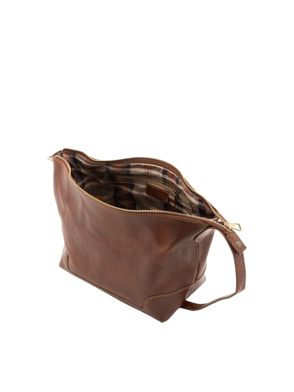 Alessia Firenze bolso de mano Unisexo Bolso unisex. El cierre es con cremallera. Los bolsillos internos son uno con cremallera. Los bolsillos externos están ausentes. Falta la correa para el hombro. El mango es de piel. Hay un compartimento interno. El material exterior es 100% Piel Auténtica. Internamente está forrado en algodón. Medidas: 24x19x18 cm. Hecho en Italia