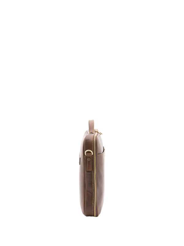 Alessia Firenze bolso de mano Unisexo Bolso unisex. El cierre es con cremallera. Los bolsillos internos son uno abierto. Los bolsillos externos son un frente abierto. La bandolera es ajustable y extraíble en piel. El mango es de piel. Hay un compartimento interno. El material exterior es 100% Piel Auténtica. Internamente está forrado en algodón. Medidas: 38x32x6 cm. Hecho en Italia