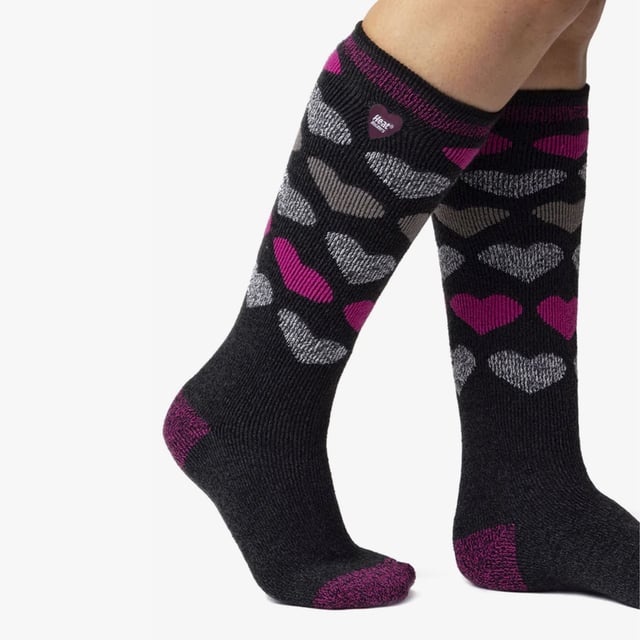 Ladies Heat Holders Lite Long Socks: The new Heat Holders Lite Sock is here! Now with an extra long style! Heat Holders' creators have listened to customers calls to create a thermal sock that isn't so chunky, now Heat Holders can fit into a normal dress shoe or trainer. But, a solid tog rating of 1.6 means your feet can still be extremely warm! With many fabulous marl twist styles to pick from, your feet will be elegant and warm at the same time, now who wouldn't want that?. This version of the Heat Holders Lite socks are extra long, coming just below the knee, giving you more warmth for your whole leg. Main Features. Heat Holders Yarn - Our Specially developed thermal yarn provides high performance insulation against cold with superior moisture breathing abilities. Heat Holders Loops - Innovative knitting technology produces our unique, extra long looped cushion pile to hold in more warm air, increasing the TOG rating. Heat Holders Brushing -Finally, our expert brushing process maximises the amount of warm air held inside each sock for total warmth and all day comfort. Heat Holders Lite Long Tog rating - These socks are scientifically tested to be 5x Warmer than a basic cotton sock, with a tog rating of 1.6. This new version of Heat Holders solves the 'to thick' element to the original Heat Holders . These socks are made from 91% Acrylic, 5% Nylon, 3% Polyester, 1% Elastane, are Ladies size 4-8 UK