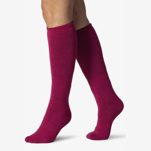 Ladies Heat Holders Lite Long Socks: The new Heat Holders Lite Sock is here! Now with an extra long style! Heat Holders' creators have listened to customers calls to create a thermal sock that isn't so chunky, now Heat Holders can fit into a normal dress shoe or trainer. But, a solid tog rating of 1.6 means your feet can still be extremely warm! With many fabulous marl twist styles to pick from, your feet will be elegant and warm at the same time, now who wouldn't want that?. This version of the Heat Holders Lite socks are extra long, coming just below the knee, giving you more warmth for your whole leg. Main Features. Heat Holders Yarn - Our Specially developed thermal yarn provides high performance insulation against cold with superior moisture breathing abilities. Heat Holders Loops - Innovative knitting technology produces our unique, extra long looped cushion pile to hold in more warm air, increasing the TOG rating. Heat Holders Brushing -Finally, our expert brushing process maximises the amount of warm air held inside each sock for total warmth and all day comfort. Heat Holders Lite Long Tog rating - These socks are scientifically tested to be 5x Warmer than a basic cotton sock, with a tog rating of 1.6. This new version of Heat Holders solves the 'to thick' element to the original Heat Holders . These socks are made from 91% Acrylic, 5% Nylon, 3% Polyester, 1% Elastane, are Ladies size 4-8 UK