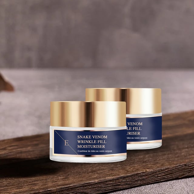 Wrinkle Fill Snake Venom Moisturiser
Wrinkle Fill Snake Venom Moisturiser contains synthetic snake venom peptide that is designed to relax expression lines that are known to cause wrinkles. This peptide combined with hydration boosting hyaluronic acid and collagen together aims to make the skin look visibly smoother, younger and plumper.
Snake Venom Peptide
Snake Venom Peptide Snake Venom Peptide is a synthetic peptide that replicates the effects of Waglerin 1, component that is found in the poisonous Temple Viper snake. It works by reducing muscular contractions in the face and reduces cell movement; thereby keeping the skin smooth and aiming to reduce wrinkles and fine lines.

Hyaluronic Acid

Hyaluronic Acid is naturally found in our skin, as we age our body's natural production of hyaluronic acid slows down. Hyaluronic acid is a key element making the skin looking plump and youthful as it hold moisture 1000 times its own weight. Our hyaluronic acid is called Sodium Hyaluronate and it is smaller size of hyaluronic acid that is able to penetrate and hydrate more deeper levels of the skin than normal hyaluronic acid.
Argan Oil
Almond Oil
Vitamin E
Shea Butter
Collagen

Collagen is naturally found in our skin and as we age the production of collagen slows down. As an skincare ingredient collagen aims to boost plumpness and the look of the skin by bringing moisture and hydration to the skin.

Directions for use: Apply pea-sized amount of the cream on cleansed face, neckline and neck in the morning.