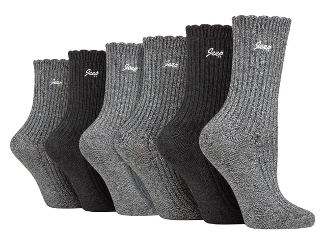 Jeep Ladies 6 Pack Scalloped Cuff Socks: Introducing the Jeep Bamboo Scalloped Top Socks, a delightful triple pack of ladies' socks that exude comfort and elegance. Crafted from an 88% Bamboo, 10% Polyester, and 2% Elastane blend, these socks offer a super-soft and silk-like feel. The fine gauge design features ribbed legs and scalloped edge cuffs for a touch of sophistication. These bamboo socks are not only a treat for the eyes but also a blessing for your feet. Bamboo, known for its gentle nature, suits all skin types, making it a perfect choice for those with sensitivities. The natural properties of bamboo include bacteria and fungal resistance, ensuring freshness throughout wear. Additionally, these socks have superior moisture-absorbing capabilities compared to cotton socks, providing a dry and comfortable feel. Wear these luxurious bamboo socks in any season, as they possess inherent thermoregulating abilities that adapt to changing temperatures. Whether you're donning shoes or boots, these socks promise a great fit and a stylish look. Each pair is elegantly embroidered with a contrasting Jeep logo, completing the perfect trio of colors and comfort. Machine washable at 40°, maintenance is effortless, so you can enjoy the pleasure of these bamboo socks again and again. Treat your feet to the indulgence they deserve with Jeep Bamboo Scalloped Top Socks. Extra Product Details: Delightful ladies' socks with comfort and elegance. 88% Bamboo, 10% Polyester, 2% Elastane blend for a silk-like feel. Gentle on all skin types, perfect for sensitivities. Bacteria and fungal resistant, ensuring lasting freshness. Superior moisture-absorption for a dry, comfortable experience. Inherent thermoregulating abilities for year-round wear. Stylish design with ribbed legs and scalloped cuffs. Effortless maintenance, machine washable at 40°.