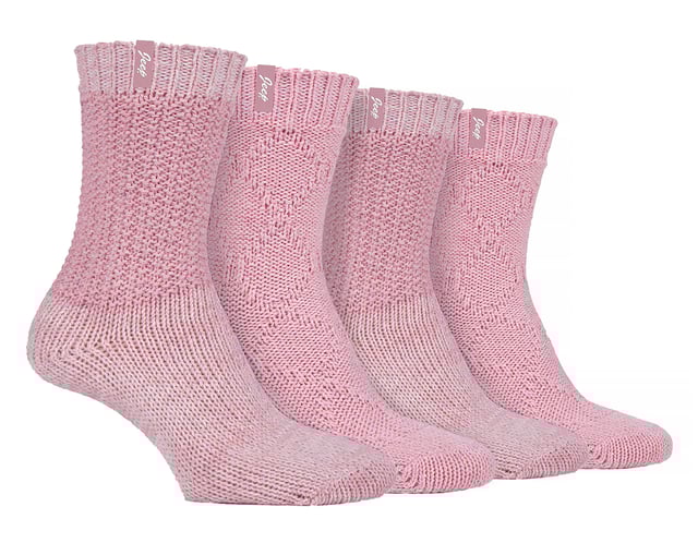 Jeep Ladies 4 Pack Cable Knit Boot Socks: Introducing our Jeep Wool Blend Cable Knit Boot Socks, a cosy and stylish addition to your outdoor and leisure wear. This 4 Pair Pack is designed for women seeking warmth, comfort, and durability in their ankle boots. Crafted from a luxurious blend of 58% Polyester, 26% Wool, 7% Acrylic, 4% Viscose, 4% Polyamide, and 1% Elastane, these socks offer a soft touch and natural warmth. The heavy-knit design and medium thickness ensure a chunky, rustic appearance with traditional knitwear patterns. One pair showcases a flat cable pattern with a diamond design, while the other features a thickly textured, moss stitch ribbed style, offering contrasting yet charming looks. Both pairs boast standard toe seams and crew leg length with lightly elasticated, ribbed cuffs for a comfortable fit. The sophisticated blend of wool, viscose, and synthetics delivers optimal warmth, breathability, durability, and softness for unparalleled comfort. Plus, the machine-washable material makes maintenance a breeze. Embrace winter with confidence and step out in style with our Jeep Wool Blend Cable Knit Boot Socks. Your feet will thank you for the cozy luxury and rugged elegance they provide. Extra Product Details: Cozy & stylish - Upgrade your outdoor wear with our Jeep Wool Blend Cable Knit Boot Socks. Warm & durable - Luxurious blend of wool, polyester, and more ensures natural warmth & lasting quality. Charming patterns - Enjoy flat cable and moss stitch designs for a rustic yet chic look. Comfortable fit - Crew leg length & lightly elasticated cuffs offer a snug feel. Optimal warmth & breathability - Sophisticated blend for unmatched comfort in chilly weather. Easy maintenance - Machine-washable material for convenient care. Rugged elegance - Embrace winter confidently with our stylish and durable boot socks. Happy feet - Treat your feet to cosy luxury and thank them with comfort all day long.