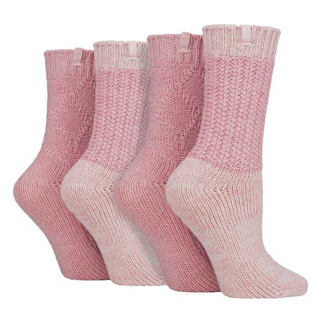 Jeep Ladies 4 Pack Cable Knit Boot Socks: Introducing our Jeep Wool Blend Cable Knit Boot Socks, a cosy and stylish addition to your outdoor and leisure wear. This 4 Pair Pack is designed for women seeking warmth, comfort, and durability in their ankle boots. Crafted from a luxurious blend of 58% Polyester, 26% Wool, 7% Acrylic, 4% Viscose, 4% Polyamide, and 1% Elastane, these socks offer a soft touch and natural warmth. The heavy-knit design and medium thickness ensure a chunky, rustic appearance with traditional knitwear patterns. One pair showcases a flat cable pattern with a diamond design, while the other features a thickly textured, moss stitch ribbed style, offering contrasting yet charming looks. Both pairs boast standard toe seams and crew leg length with lightly elasticated, ribbed cuffs for a comfortable fit. The sophisticated blend of wool, viscose, and synthetics delivers optimal warmth, breathability, durability, and softness for unparalleled comfort. Plus, the machine-washable material makes maintenance a breeze. Embrace winter with confidence and step out in style with our Jeep Wool Blend Cable Knit Boot Socks. Your feet will thank you for the cozy luxury and rugged elegance they provide. Extra Product Details: Cozy & stylish - Upgrade your outdoor wear with our Jeep Wool Blend Cable Knit Boot Socks. Warm & durable - Luxurious blend of wool, polyester, and more ensures natural warmth & lasting quality. Charming patterns - Enjoy flat cable and moss stitch designs for a rustic yet chic look. Comfortable fit - Crew leg length & lightly elasticated cuffs offer a snug feel. Optimal warmth & breathability - Sophisticated blend for unmatched comfort in chilly weather. Easy maintenance - Machine-washable material for convenient care. Rugged elegance - Embrace winter confidently with our stylish and durable boot socks. Happy feet - Treat your feet to cosy luxury and thank them with comfort all day long.