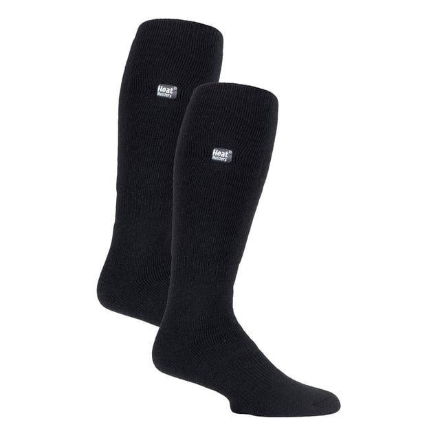 Heat Holders Mens 2 Pairs 1.6 TOG Lite Long Knee High Socks: Experience the pinnacle of warmth with the Heat Holders Men's 2 Pairs 1.6 TOG Lite Long Knee High Socks. Expertly engineered, these medium-thick thermal socks make a splendid addition to your wardrobe, providing unmatched warmth in all weathers. They are an essential addition for every man prioritising comfort during winter. Heat Holders socks are a masterstroke of thermal technology, offering an exceptional blend of warmth, comfort, and style. Equally suitable for indoor and outdoor activities, these socks seamlessly fit into your versatile lifestyle. Made with soft-brushed thermal yarn, these socks are an ideal fit for an all-round warmth experience. Heat Holders Men's 1.6 TOG Lite Long Knee High Socks hold a plethora of features. The unique thermal technology holds a timeless appeal while ensuring ongoing warmth. What's more, the medium-thick fabric gives a cosy feel and our TOG rated warmth assures top-level insulation keeping your feet warm and comfortable. Indulge in a perfect blend of warmth and style with Heat Holders- Your ultimate choice for premium thermal wear. Essential Product Details: - One pair in each pack - Standard toe seams and cuffs - Soft brushed thermal yarn - Heat Holders Technology - 1.6 TOG Rating - Perfect for both outdoors and comfy home-lounging - Range of Sizes Available - Machine Washable