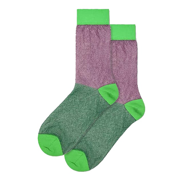 Light Colourful Thin Glittery Socks by Happy Socks: Dive into a delightful comfort with the Light Colourful Thin Glittery Socks by Happy Socks. Fashioned to flatter feet in sizes 36-40 and 41-46, these alluring socks seamlessly harmonize with both relaxed and upscale outfits, making them a brilliant stroke to your sock drawer. The soothing comfort is woven into every pair, shaping them as a lighthearted staple for anyone. The Happy Socks Glittery series has been lovingly crafted with the intention to sweeten your step, much like a confectionery does for the taste buds. Combining ultra-lightweight design, a twinkle reminiscent of stardust, and an adaptability that spans across the seasons, these socks are curated to accompany you on any occasion. Though made from thin polyamide, their resilience is borrowed from socks of greater thickness, adorned with that extra shimmer, and served in shades of Blue and Green. Each pair of these Light Colourful Thin Glittery Socks carries a wealth of advantages. The translucent, glitter-infused charm adds a sprinkle of elegance, while the diaphanous material ensures unyielding comfort. Made from 84% Polyamide, these socks bear the strength required for enduring wear. Prime Product Insights: - Exuberant, glitter-accented style - Superior 84% Polyamide fabric - Ethereal yet sturdy construction - Adaptable to all climates - Equally suited for casual and formal milieu
