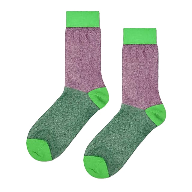 Light Colourful Thin Glittery Socks by Happy Socks: Dive into a delightful comfort with the Light Colourful Thin Glittery Socks by Happy Socks. Fashioned to flatter feet in sizes 36-40 and 41-46, these alluring socks seamlessly harmonize with both relaxed and upscale outfits, making them a brilliant stroke to your sock drawer. The soothing comfort is woven into every pair, shaping them as a lighthearted staple for anyone. The Happy Socks Glittery series has been lovingly crafted with the intention to sweeten your step, much like a confectionery does for the taste buds. Combining ultra-lightweight design, a twinkle reminiscent of stardust, and an adaptability that spans across the seasons, these socks are curated to accompany you on any occasion. Though made from thin polyamide, their resilience is borrowed from socks of greater thickness, adorned with that extra shimmer, and served in shades of Blue and Green. Each pair of these Light Colourful Thin Glittery Socks carries a wealth of advantages. The translucent, glitter-infused charm adds a sprinkle of elegance, while the diaphanous material ensures unyielding comfort. Made from 84% Polyamide, these socks bear the strength required for enduring wear. Prime Product Insights: - Exuberant, glitter-accented style - Superior 84% Polyamide fabric - Ethereal yet sturdy construction - Adaptable to all climates - Equally suited for casual and formal milieu