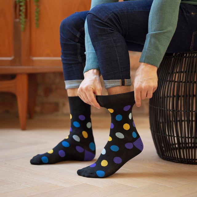 Gentle Grip Men's Patterned Socks - Fun, Comfortable, and Stylish: Experience the perfect blend of comfort and style with the Gentle Grip Men's Patterned Socks 6-Pair Set. Made from soft and breathable fabric, these socks are designed to keep your feet cosy and comfortable all day long. Featuring a mix of fun and vibrant designs like Team Dog, bugs, vehicles, and coffee patterns, these socks add a playful touch to your everyday wardrobe. The unique gentle grip technology ensures a secure, non-restrictive fit, making them perfect for men with sensitive skin. Each pack includes six different pairs, offering variety and versatility in your sock drawer. These socks are easy to care for, retaining their softness and shape after multiple washes. Whether you're out running errands, at work, or relaxing at home, these novelty socks will keep your feet comfortable and stylish. Treat yourself or surprise a loved one with these fun and practical socks that combine style, comfort, and function. Extra Product Details: - Soft and Comfortable Fabric for All-Day Wear - Gentle Grip Technology for a Secure, Non-Restrictive Fit - Includes Six Pairs with Fun and Vibrant Designs - Perfect for Sensitive Skin - Machine Washable for Easy Care