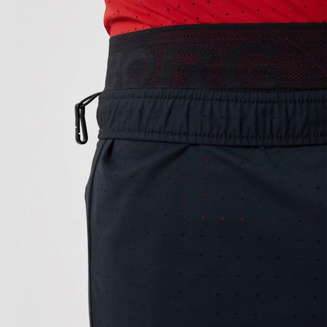 Borg Running Perforated 5" Shorts - Ultimate Breathable Comfort: Elevate your running experience with the Björn Borg Borg Running Perforated 5" Shorts, designed for athletes seeking both performance and comfort. Crafted from lightweight, recycled polyester, these shorts feature perforated fabric for enhanced breathability, ensuring you stay cool during intense workouts. The shorts have a regular fit, a comfortable elastic waistband with a drawstring, and side pockets for convenience. Extra Product details:. 100% Recycled Polyester Regular Fit Perforated Fabric for Breathability Elastic Waistband with Drawstring Side Pockets Machine Washable. These shorts are a perfect blend of functionality and sustainability, making them a great addition to your running gear.