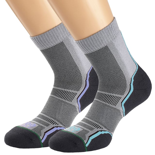 1000 Mile Women's Trail Running SocksExperience ultimate comfort and support with the 1000 Mile Trail Running Socks. Designed for off-road running, these socks cater to the challenges presented by varying weather and terrains. Crafted with a carefully chosen Merino wool blend, they offer a luxuriously soft feel while minimizing friction. The moisture-wicking properties of the merino wool help keep your feet cool and dry, aided by its quick-drying nature. The natural anti-bacterial qualities of the wool keep your feet fresh during long distances. Our socks feature strategic padding for the toes, ball of the foot, and even extend to protect the Achilles tendon. Ventilation zones on the top of the foot promote airflow and breathability, ensuring lasting coolness. The flat toe seam prevents irritation and potential friction from bulky seams. These running socks are made with 53% polyamide, 24% wool, 22% acrylic, 1% elastane. Available in ladies sizes: Small (3-5.5 UK, EUR 36-38.5) and Medium (6-8.5 UK, EUR 39-42.5).Extra Product DetailsUltimate comfort and support for off-road running.Merino wool blend reduces friction, keeps feet comfortable.Moisture-wicking to keep feet cool and dry.Natural anti-bacterial qualities for freshness during long distances.Strategic padding for toe and Achilles tendon protection.Ventilation zones promote airflow and keep feet cool.Completely flat toe seam eliminates irritation.Durable material, available in various sizes for perfect fit.