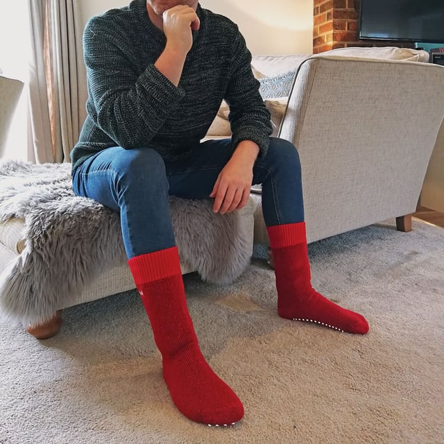 Mens THMO Slipper Socks: THMO thermal slipper socks have been made with a heavy bulk acrylic yarn with extreme thermal qualities. They have been double brushed on the inside to maximise warmth by trapping warm air and keeping it close to your feet. This brushing also softens the inside of the sock making it a great choice for indoor relaxing. These thermal socks also feel like they are seamless with a neat hand-linked toe. The ribbed welt at the top of the sock has been designed to rest to the natural contours of your legs. This wide soft top provides all day comfort and will reduce the chances of nasty constriction rings developing around your legs. The THMO badge is also heat transferred onto the side of the sock. This is the THMO slipper version for the thermal socks. An anti slip grip has been designed onto the foot of the sock in order to prevent you from slipping on surfaces such as hard wooden floors or kitchen tiles. These men's THMO thermal slipper socks are available in 2 colours including black and navy, the grip is a white dotted design. They are a size 6-11 and they are made from 93% Acrylic, 6% Polyamide, 1% Elastane. They are also safely machine washable. Extra Product Details: - THMO - Slipper Socks - Double Brushed - Hand Linked Toe - Ribbed Welt - 1 Pair Pack - 2 Colours to choose between - 6-11 - 93% Acrylic, 6% Polyamide, 1% Elastane