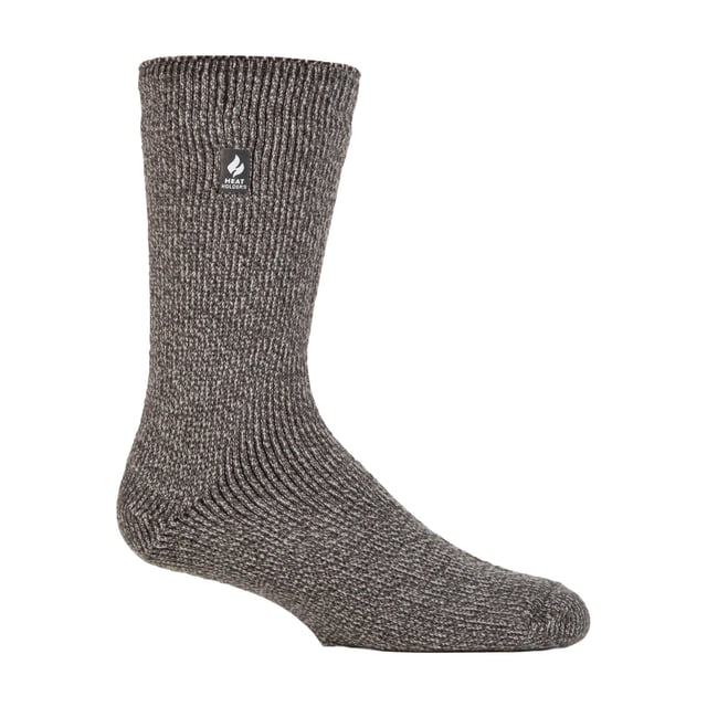 Calcetines térmicos de lana merino Heat Holders para hombre: Mantén tus pies abrigados en los días más fríos del invierno con estos calcetines térmicos Heat Holders de 2,9 TOG. Estos calcetines térmicos han combinado la retención de calor natural y propiedades de absorción de la lana merino, con la innovadora tecnología de tejido de punto que hace Heat Holders tan caliente. El pelo en bucle más largo y el suave cepillado interior garantizan la retención del calor y la amortiguación de los pies para ofrecer calidez y comodidad durante todo el día. Para proporcionar una mayor amortiguación y durabilidad, también se han añadido al calcetín un talón y una puntera reforzados. Estos calcetines térmicos son ideales para actividades al aire libre, o si pasas largos periodos de tiempo enfrentándote a los elementos. Por lo tanto, si usted es un ávido amante de las actividades al aire libre, le encantará la calidez, el grosor y la durabilidad que estos calcetines le ofrecerán. Estos calcetines de lana merino para hombre están disponibles en varios colores y están fabricados con un 54% de acrílico, un 36% de lana y un 5% de nailon, un 4% de poliéster y un 1% de elastano. Son lavables a máquina (en ciclo delicado) y están disponibles en paquetes de un par. Detalles adicionales del producto: - Paquete de 1 par - 6-11 UK - Talón y puntera reforzados - Lana Merino - Interior suave cepillado - Clasificación TOG 2.9 - Lavado a máquina en frío con ciclo delicado - 54% Acrílico 36% Lana 5% Nylon 4% Poliéster 1% Elastano