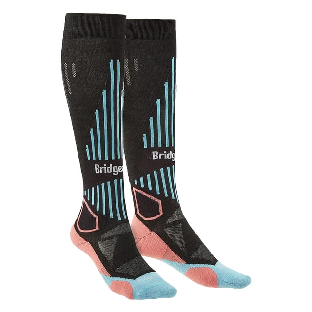 Women's Performance Lightweight Ski Socks: Embrace the ultimate fusion of technology and tailored comfort with our Women's Performance Lightweight Ski Socks. Fashioned to enrich your skiing escapades, these socks are imbued with a Performance Fit that meticulously contours to your feet. Whether you're navigating frosty trails or gliding on powdery slopes, expect a ceaseless bond between sock and skin that enhances every flex and turn. Expertly woven with the ambition to keep the contemporary skier's feet dry, comfy, and warm, our socks come equipped with an elite Moisture Management system and ThermoFit technology. The bliss of a Flat toe seam combined with intentional ShockZones affords your feet the comfort to ski from dawn until dusk. These performance-driven ski socks also feature a women-specific fit, providing that resilient support uniquely suited to the shape of a woman's foot. Topped with our signature Y-Heel design, they deliver a flawless fit that guards against slippage, ensuring your focus remains undisturbed on the thrilling alpine downhills. Experience the exceptional – these socks are your pledge for sanguine ski sessions. Key Product Specifications: - Tailored Women’s Fit - Advanced Moisture Management - Innovative ThermoFit Warmth - Smooth Flat toe seam - Protective ShockZones - Secure Y-Heel Design - Performance Fit for Stability - Lightweight, Breathable Fabric