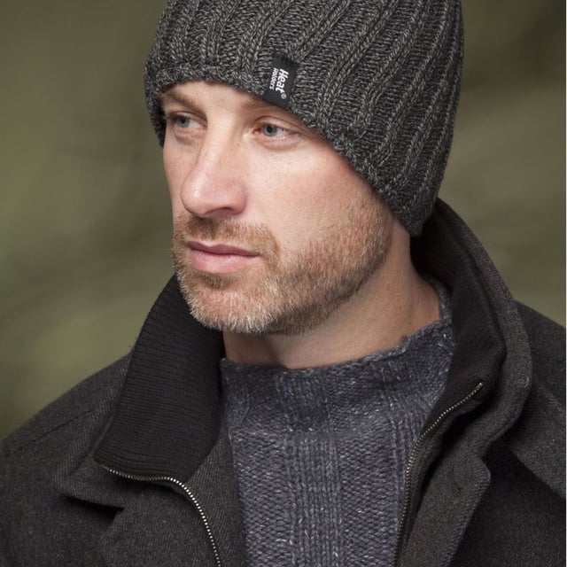 Heat Holders - Chunky Ribbed Hat: Embrace warmth and unbeatable style with the ultimate winter accessory, the Chunky Ribbed Hat by Heat Holders. With its attractive ribbed design and revolutionary Heatweaver technology, this beanie hat provides unrivaled warmth and comfort, making it perfect for any winter ensemble. Packed with superior warmth, exceptional comfort, efficient moisture-wicking properties, durability, and style, Heat Holders is your trusted brand for battling frigid conditions. Its luxurious Heatweaver fleece lining ensures an extra layer of softness and insulation, keeping you cozy and snug during the day. The Chunky Ribbed Hat, made with high-quality fibers, boasts a meticulous attention to detail, ensuring an enduring and long-lasting product. Its versatility in design includes cable knit exteriors and the fleece lining, offering maximum comfort without disregarding style. Heat Holders hats are ideal for keeping your head warm even on the coldest days of winter. With their advanced insulation technology and breathable, lightweight materials, they deliver a top-level comfort making you hardly even notice you're wearing them. Essential Product Details: - Advanced Heatweaver technology - Luxurious fleece lining -High-end material - Soft ribbed beanie design - Perfect for cold weather conditions - Machine Washable