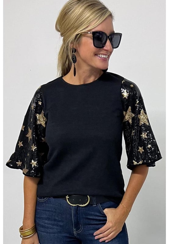Top de punto a la moda  
Cuello redondo relajado  
Mangas en contraste  
Mangas farol con lentejuelas y estrellas  
Versátil para diferentes ocasiones  
Disponible en diferentes tallas  
Material de alta elasticidad  
Envío rápido a nivel mundial  
Unisex  