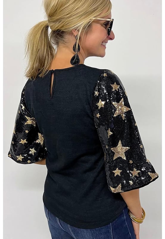 Top de punto a la moda  
Cuello redondo relajado  
Mangas en contraste  
Mangas farol con lentejuelas y estrellas  
Versátil para diferentes ocasiones  
Disponible en diferentes tallas  
Material de alta elasticidad  
Envío rápido a nivel mundial  
Unisex  