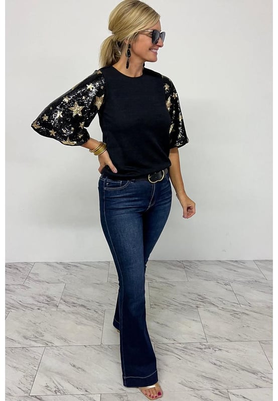 Top de punto a la moda  
Cuello redondo relajado  
Mangas en contraste  
Mangas farol con lentejuelas y estrellas  
Versátil para diferentes ocasiones  
Disponible en diferentes tallas  
Material de alta elasticidad  
Envío rápido a nivel mundial  
Unisex  