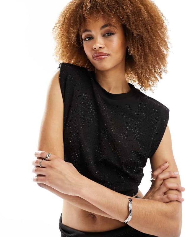 Tops by AllSaints Can't top this Crew neck Padded shoulders Sleeveless style Diamante embellishment Regular fitSold By: Asos