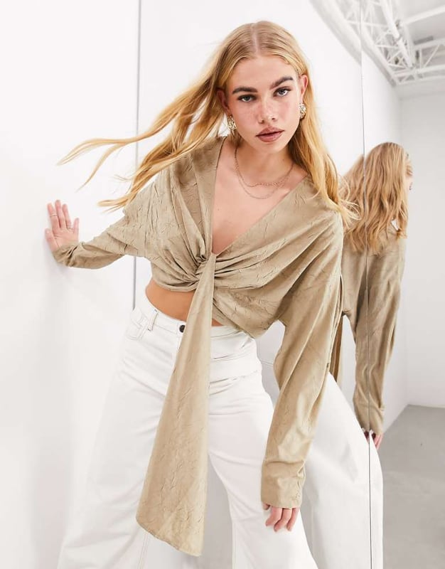 Tops by ASOS EDITION Waist-up dressing V-neck Long sleeves Drape front Ruched back Regular fitSold By: Asos